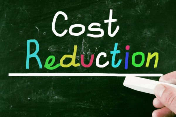 cost reduction written on a chalkboard