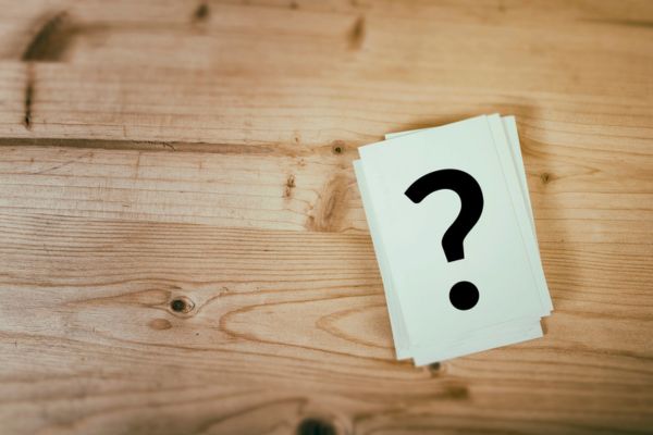 question mark on a stack of paper depicting Commercial Propane Supplier FAQs