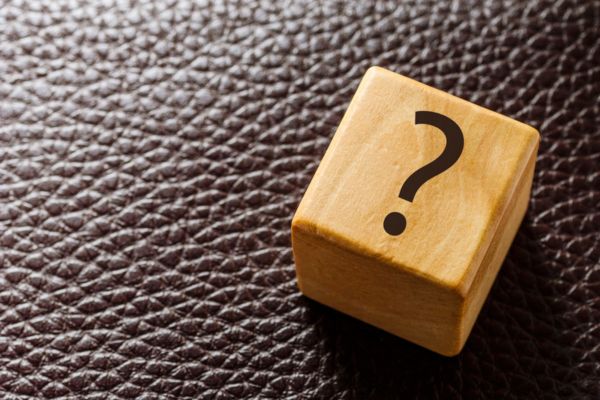question mark on a wooden cube depicting Propane for Restaurant FAQs