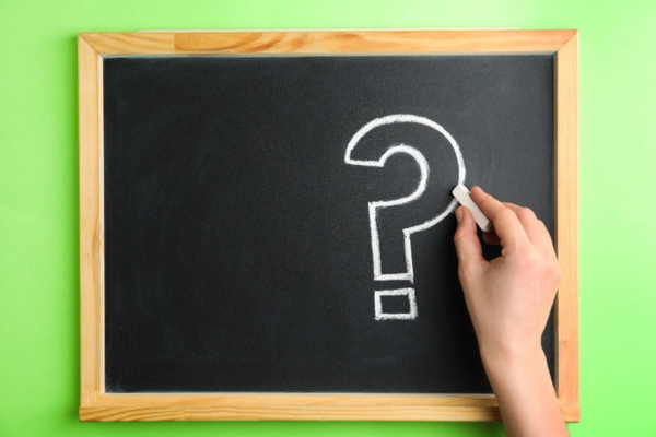 question mark written on a mini chalkboard depicting Propane Energy FAQs