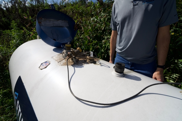 checking propane tank